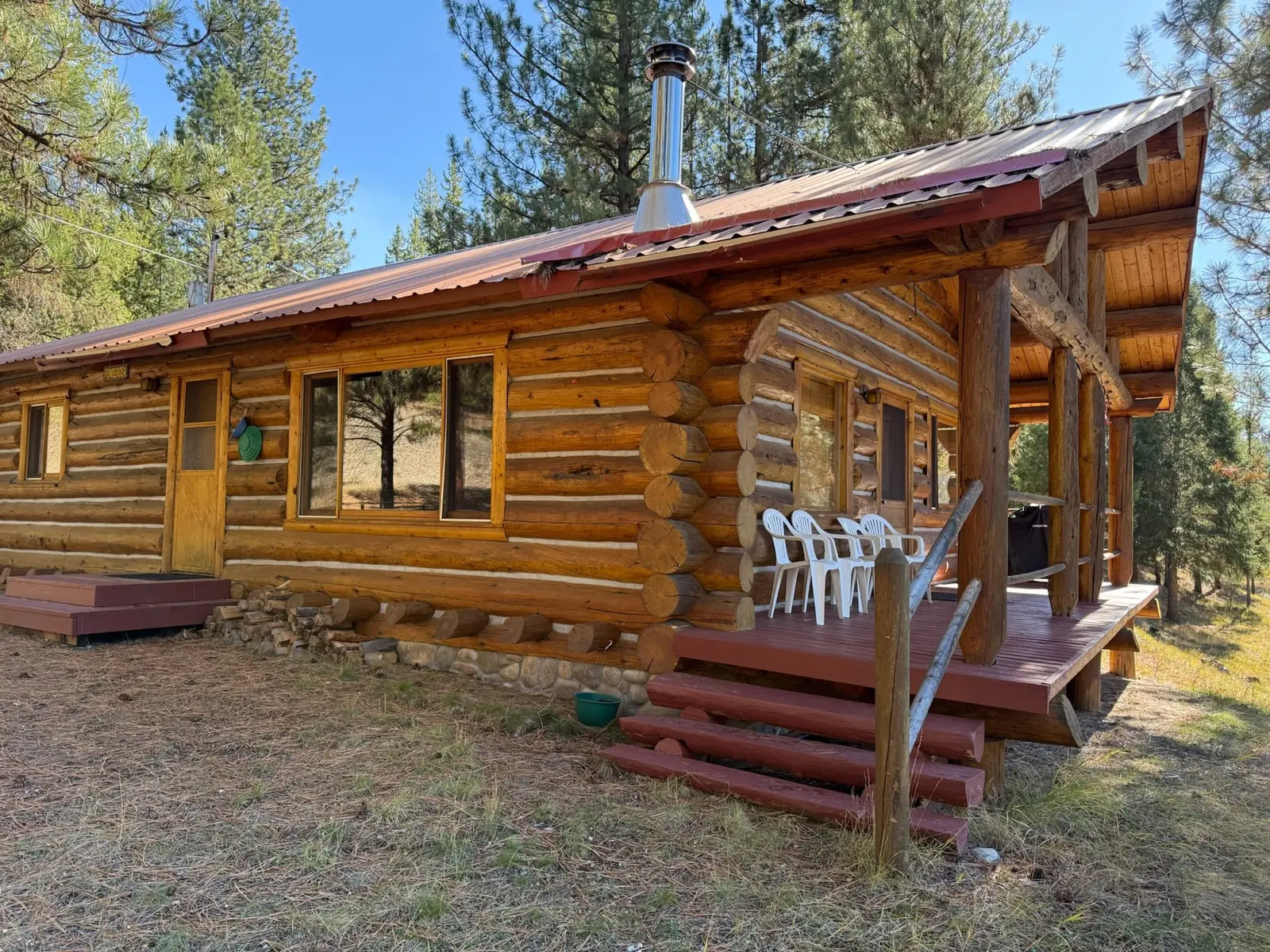 The Ponderosa, a log cabin with a covered porch