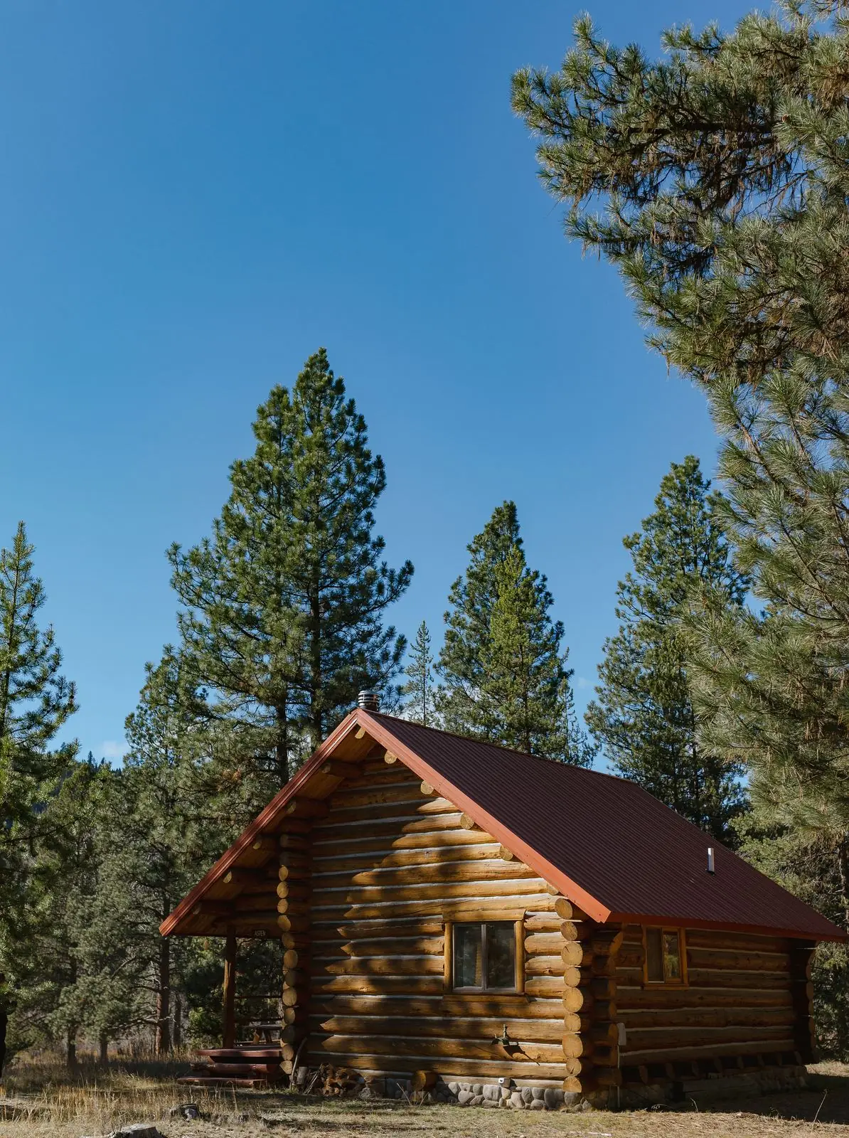 A small log cabin in the pines on Alta Ranch